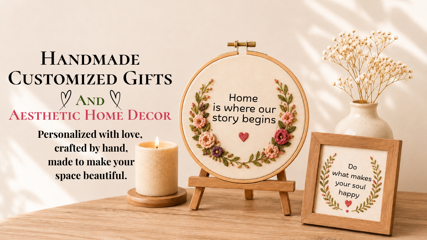 A warm and elegant blog banner promoting handmade customized gifts and aesthetic home decor. The image features a floral embroidery hoop displayed on a wooden easel with the quote "Home is where our story begins." Beside it is a wooden frame embroidered with the message "Do what makes your soul happy." The arrangement also includes a lit candle and a ceramic vase filled with dried baby's breath flowers, placed on a wooden table against a soft beige background with natural sunlight shadows. The left side of the image displays the heading "Handmade Customized Gifts and Aesthetic Home Decor" along with a message about creating beautiful spaces through handcrafted products.