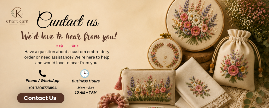 Contact Us banner featuring handmade embroidery hoop frames, embroidered pouch, floral drawstring bag, embroidered handkerchief, and custom embroidery products by craftkam on a soft beige background.